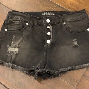 Distressed button up black jean shorts